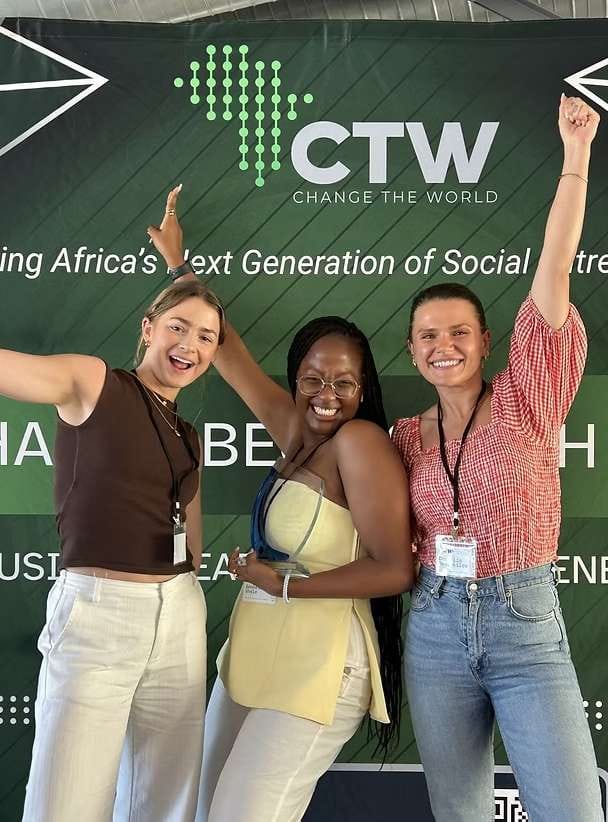 NAVU team members at the Hult Prize welcome wall in Cape Town